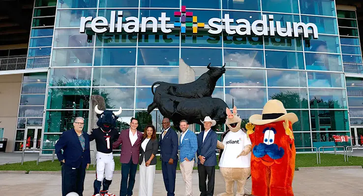 Reliant Stadium sign with mascots and leaders
