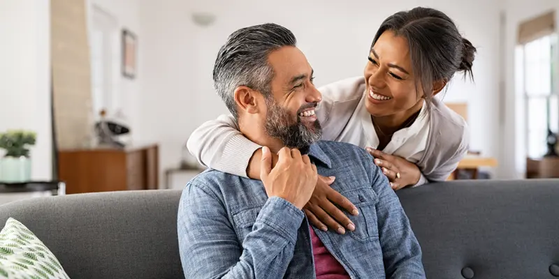 couple laughing after a prank