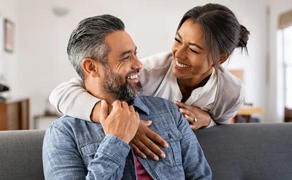 couple laughing after a prank