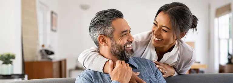 couple laughing after a prank