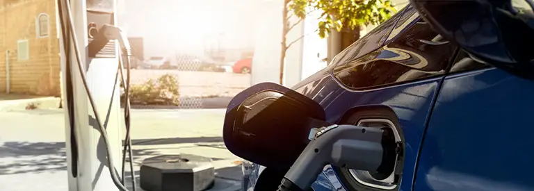 Electric vehicle charging at EV charging station