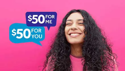 Woman smiling and promoting the 50/50 Reliant plan