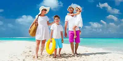Family on the beach walking