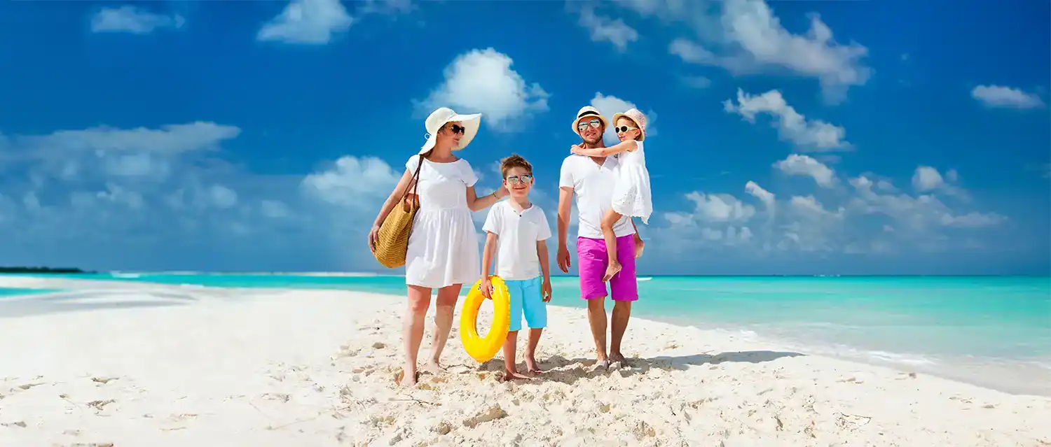 Family on the beach walking